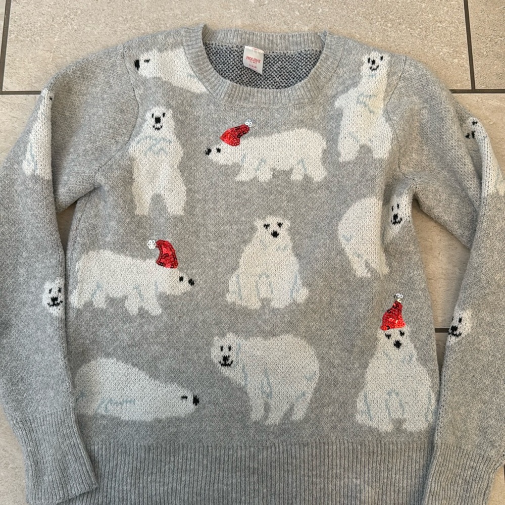 Christmas sweater with polar bears in Santa hats